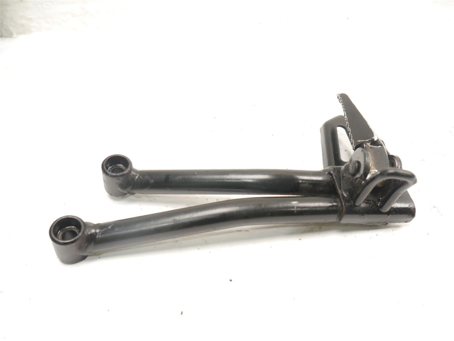 SUZUKI GSXS 125 2017-2021 LEFT REAR FOOTREST AND HANGER