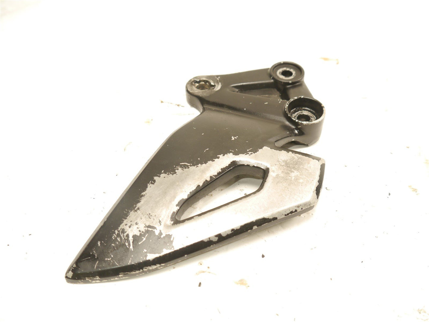 SUZUKI GSXS 125 2017-2021 FRONT LEFT FOOTREST HANGER