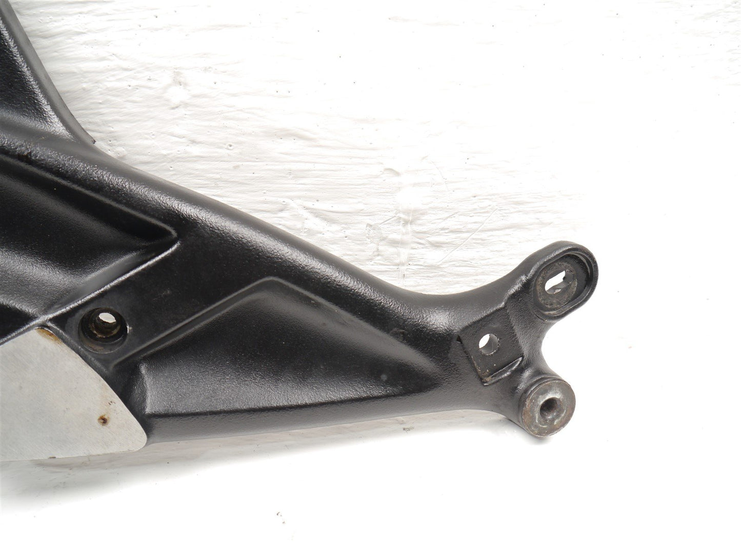 TRIUMPH TROPHY 900 1996-2001 LEFT FOOTREST HANGER