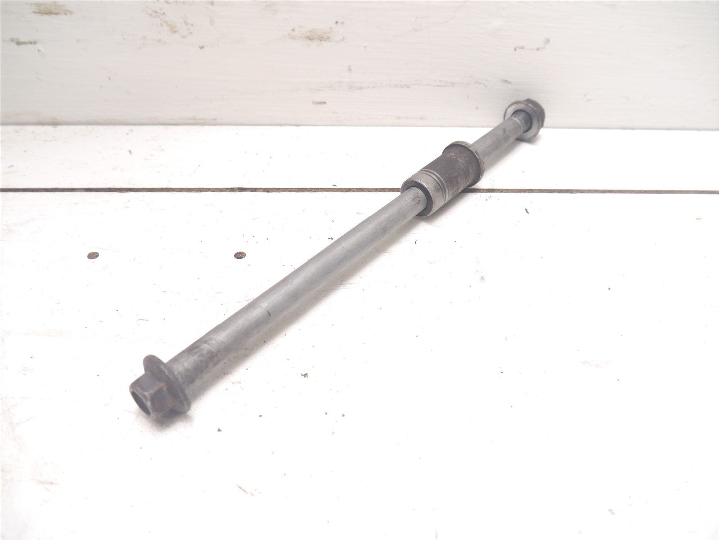 HONDA PS PES 125 2006-2013 FRONT WHEEL SPINDLE AXLE WITH SPACER AND NUT