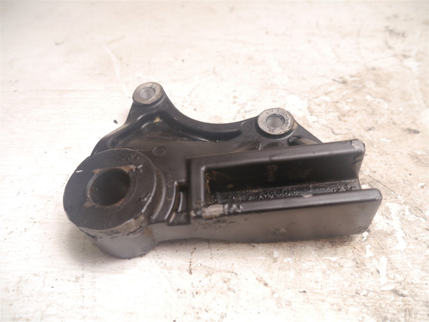 SYM WOLF SB125 2012-2021 REAR BRAKE CALIPER MOUNT