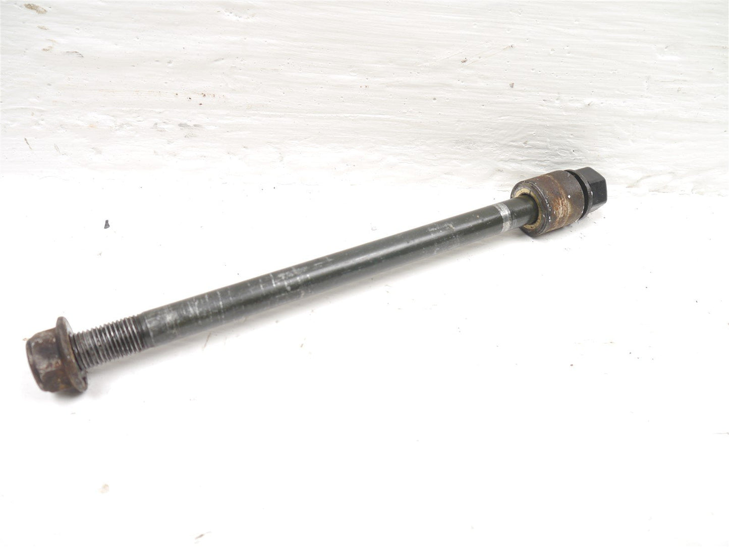 SYM XS125 K FRONT WHEEL SPINDLE