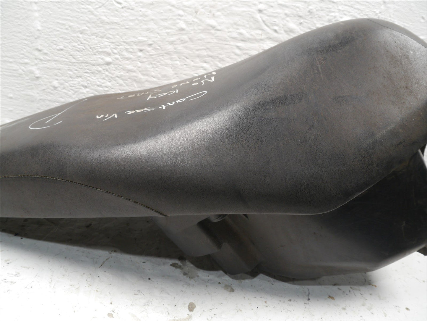 HONDA NSC110 VISION 2012-2016 SEAT AND STORAGE TUB (TORN)