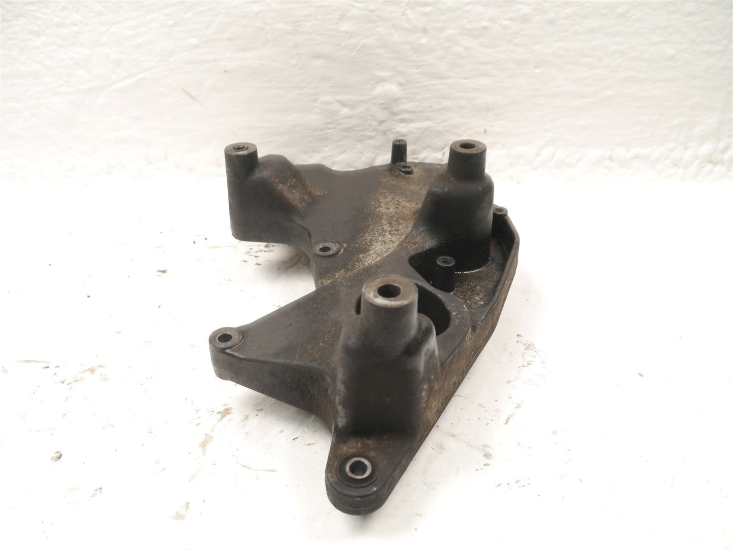 HONDA FES 125 S-WING REAR WHEEL MOUNT BRACKET