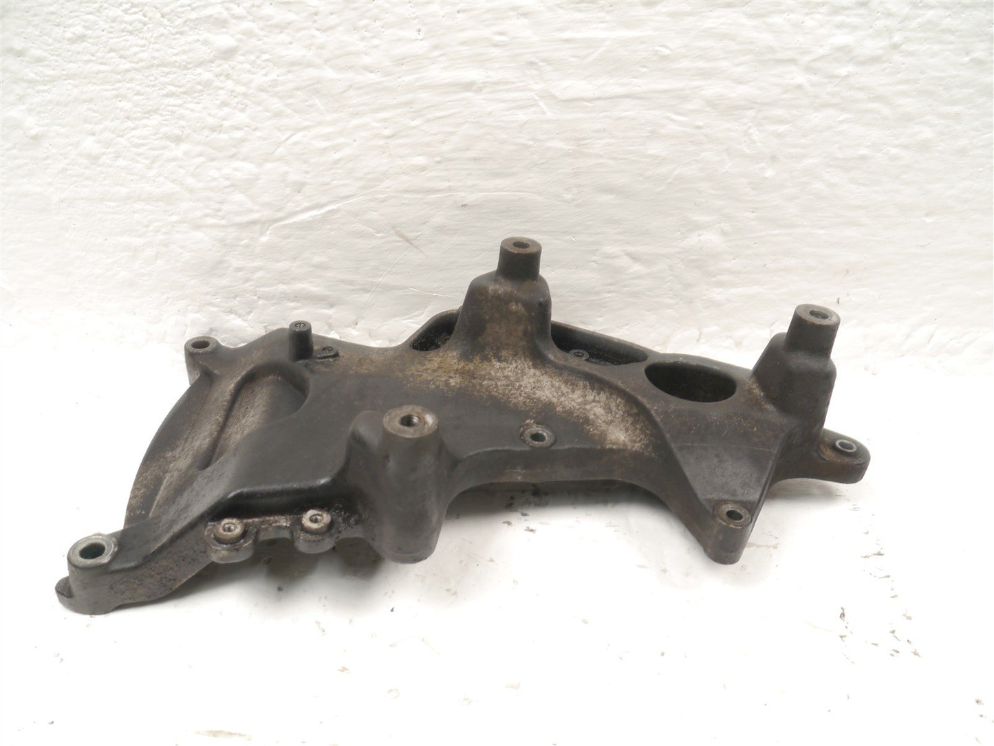 HONDA FES 125 S-WING REAR WHEEL MOUNT BRACKET
