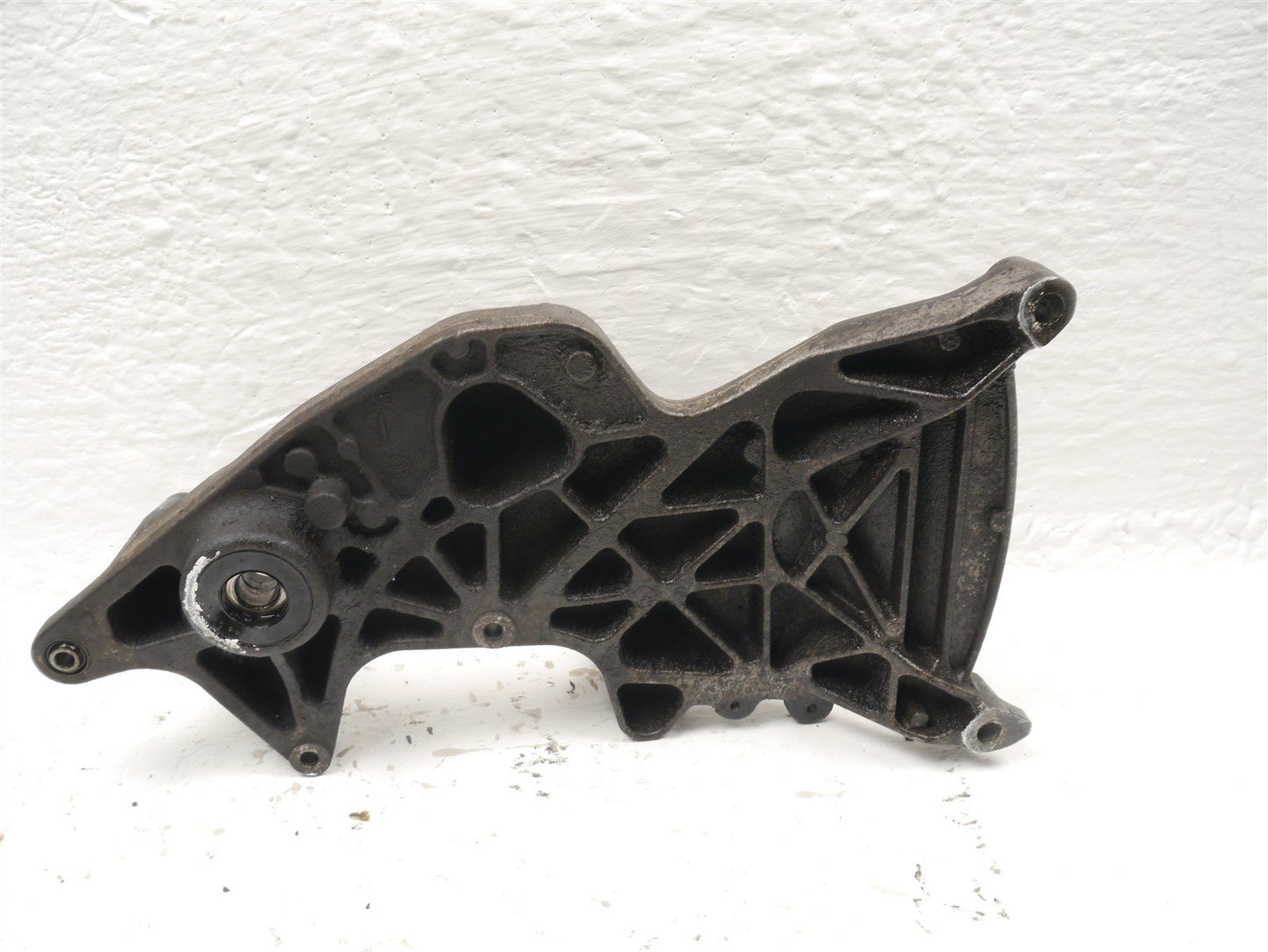 HONDA FES 125 S-WING REAR WHEEL MOUNT BRACKET
