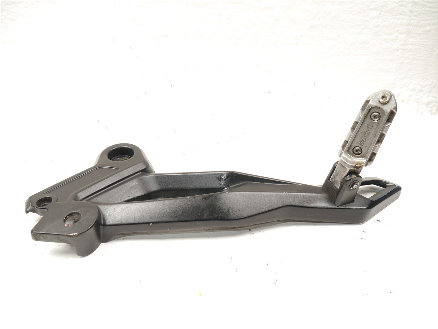 BENELLI 502 C LEFT FOOTREST HANGER