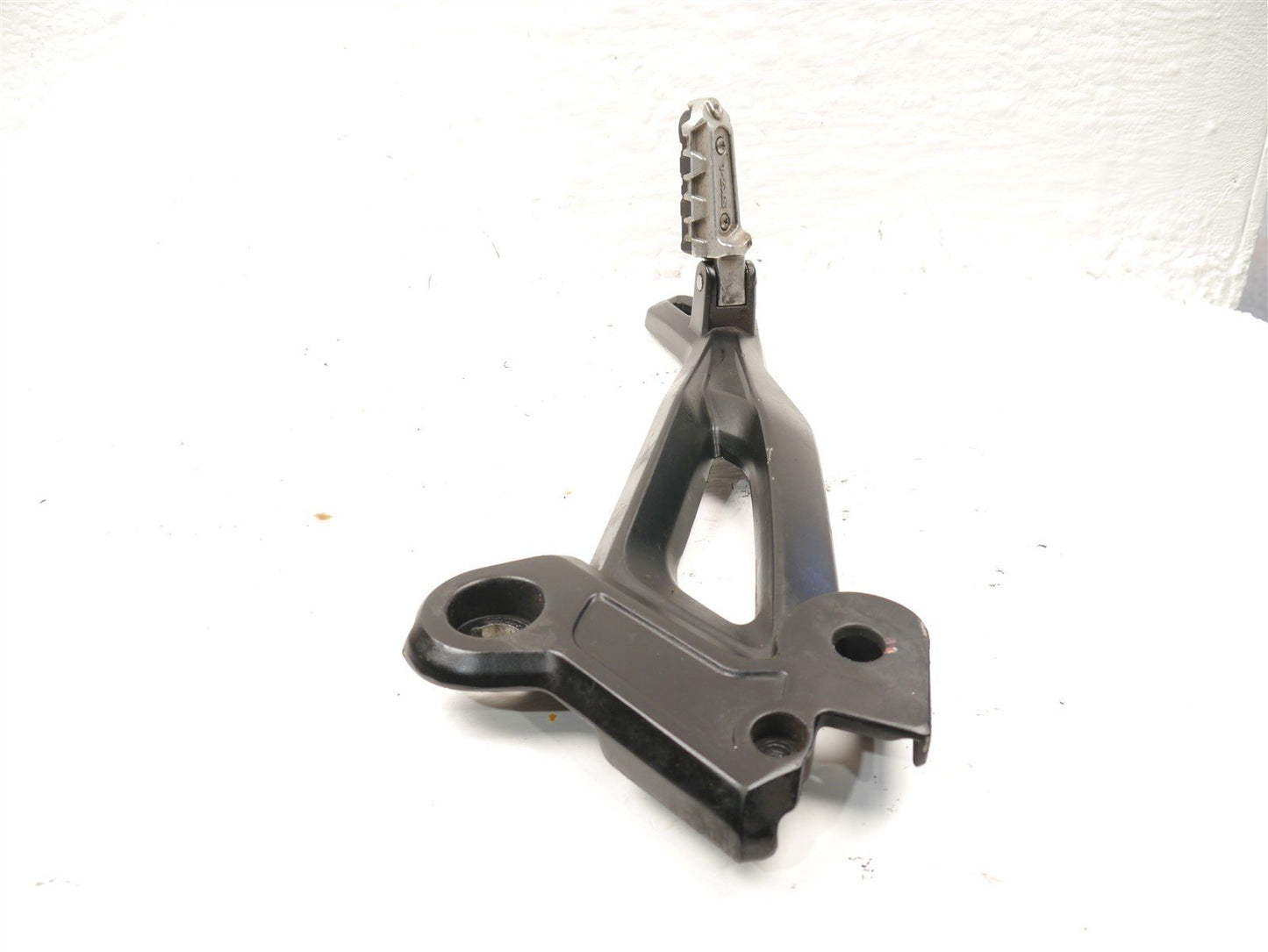 BENELLI 502 C LEFT FOOTREST HANGER