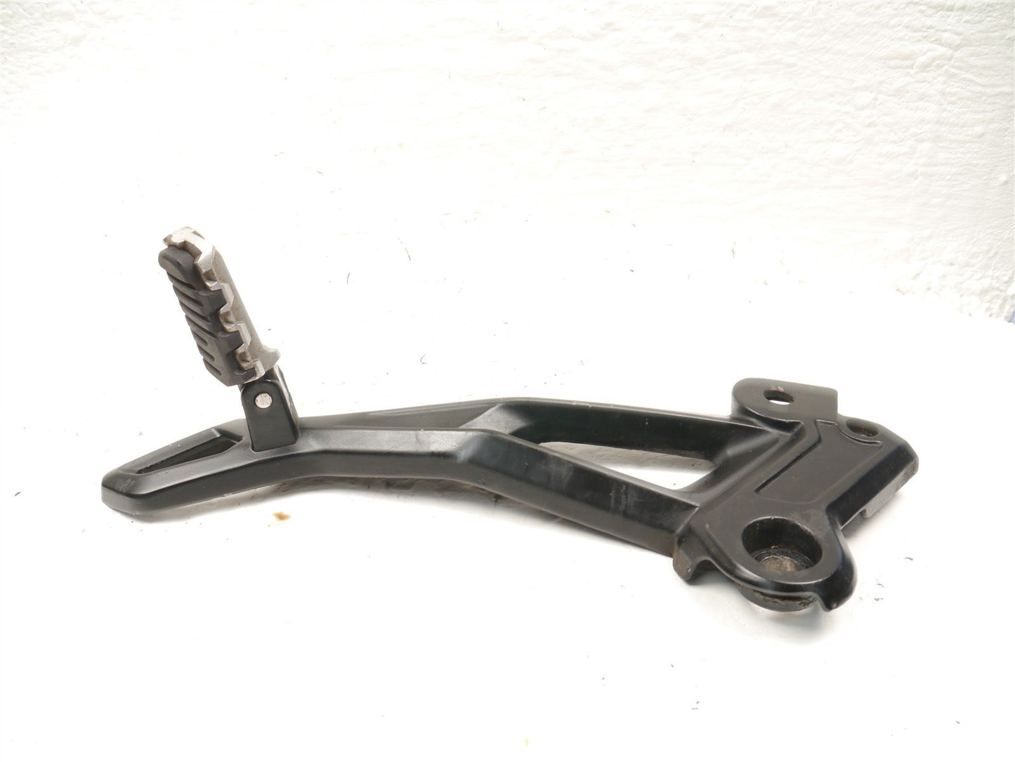 BENELLI 502 C LEFT FOOTREST HANGER