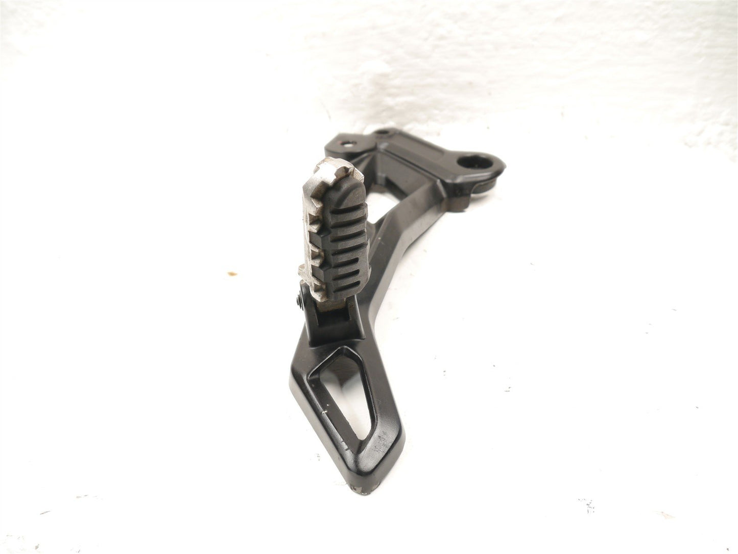 BENELLI 502 C LEFT FOOTREST HANGER