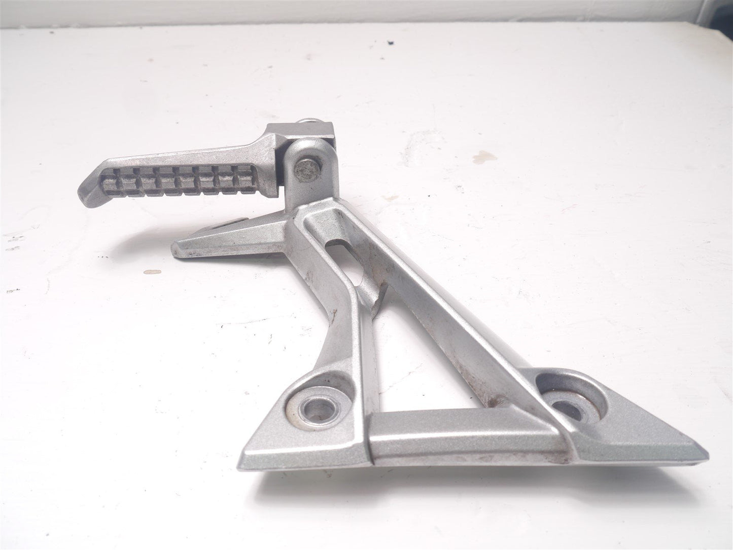 LEXMOTO LXR125 SY125 2019-2021 LEFT REAR FOOTREST HANGER AND PEG