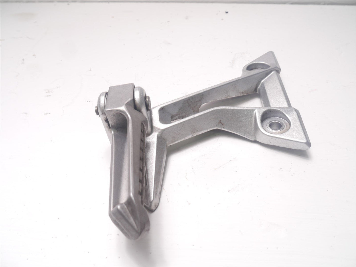 LEXMOTO LXR125 SY125 2019-2021 LEFT REAR FOOTREST HANGER AND PEG